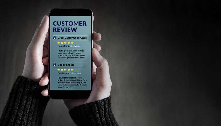 person reading reviews on smartphone